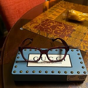 Gucci Eyeglasses   New with Gucci stand